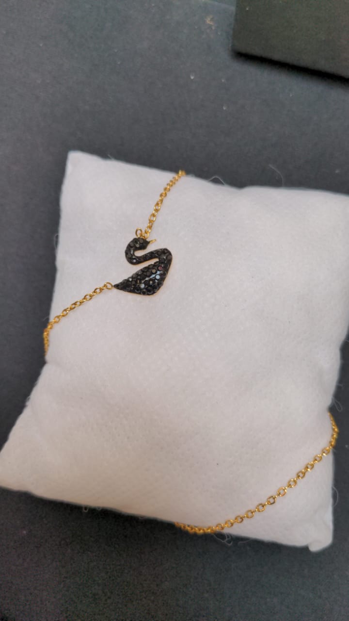 Gold-Tone Swan Pendant Necklace with Black Crystal Detailing – The Sam Collection