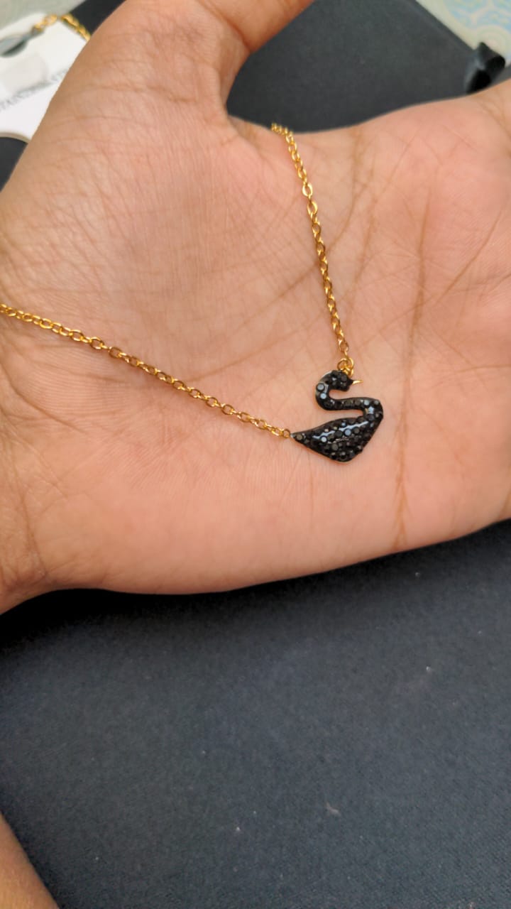 Gold-Tone Swan Pendant Necklace with Black Crystal Detailing – The Sam Collection
