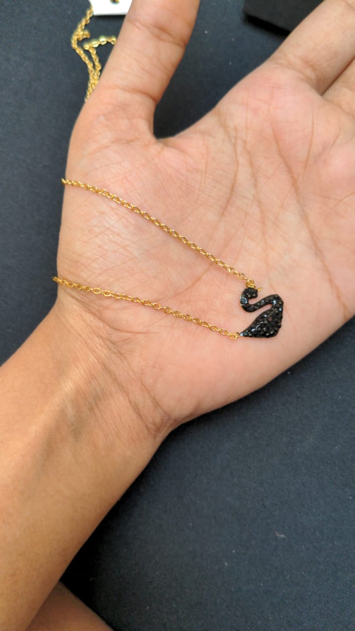 Gold-Tone Swan Pendant Necklace with Black Crystal Detailing – The Sam Collection